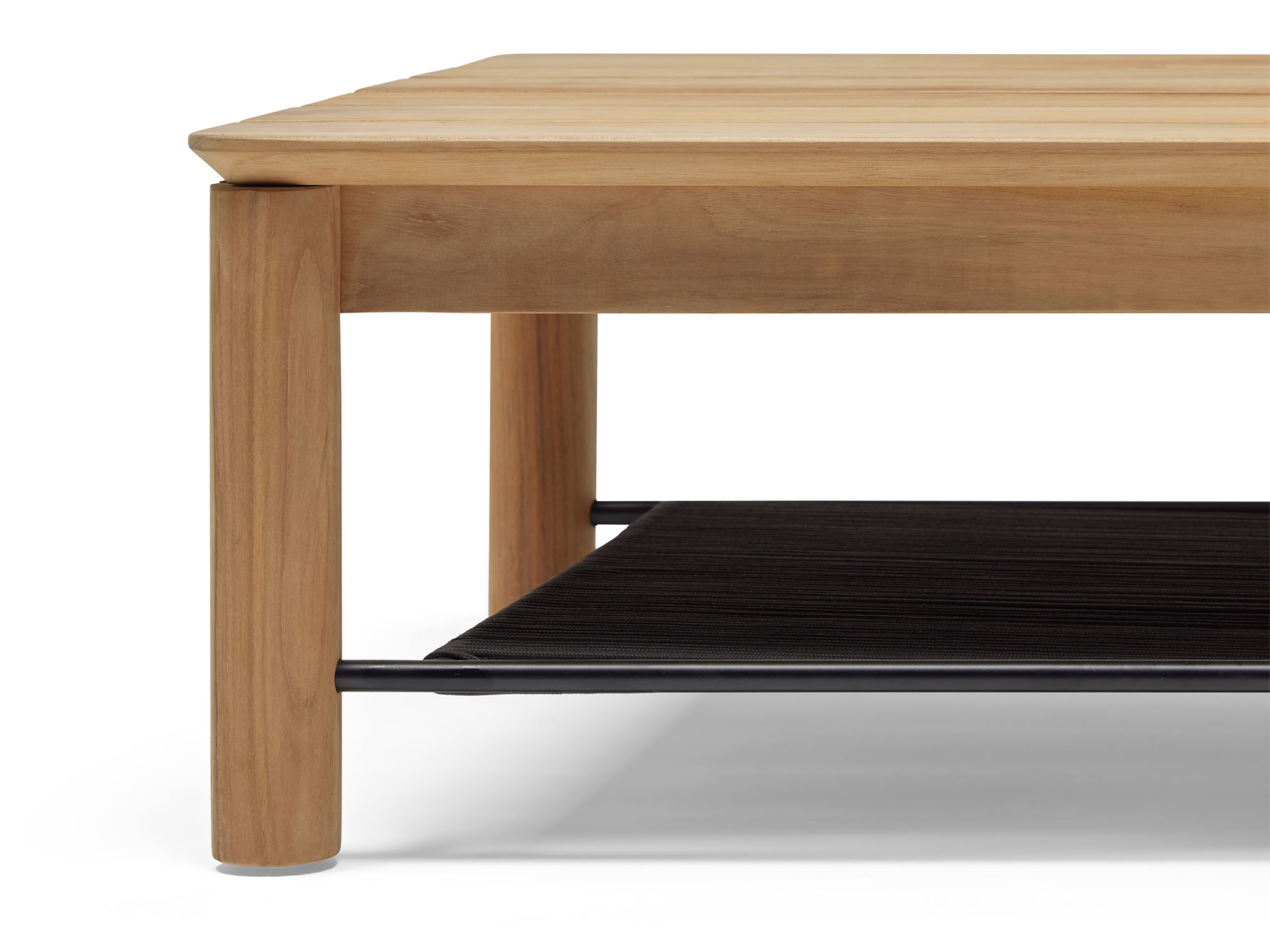 Side detail view of wooden outdoor coffee table